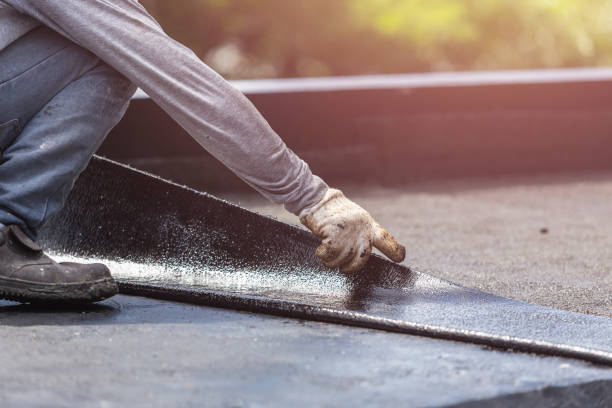 Professional Basement Waterproofing technician working in Norwich, NY